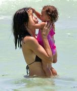 th_597676648_AdrianaLima_EnjoyadayofsunandsurfinSouthBeachinMiamiJuly242011_By_oTTo16_122_455lo.jpg